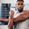 African American Man Stretching After Workout Pur-Pharma Blog