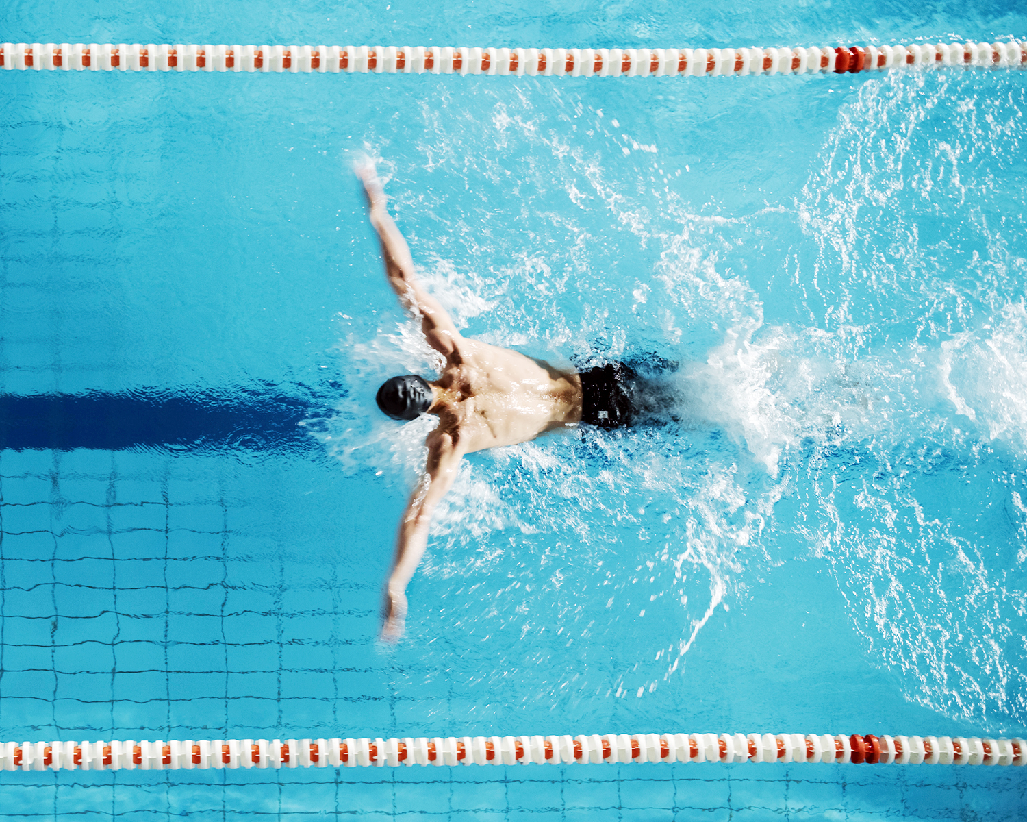 Man Swimming in Pool Fitness