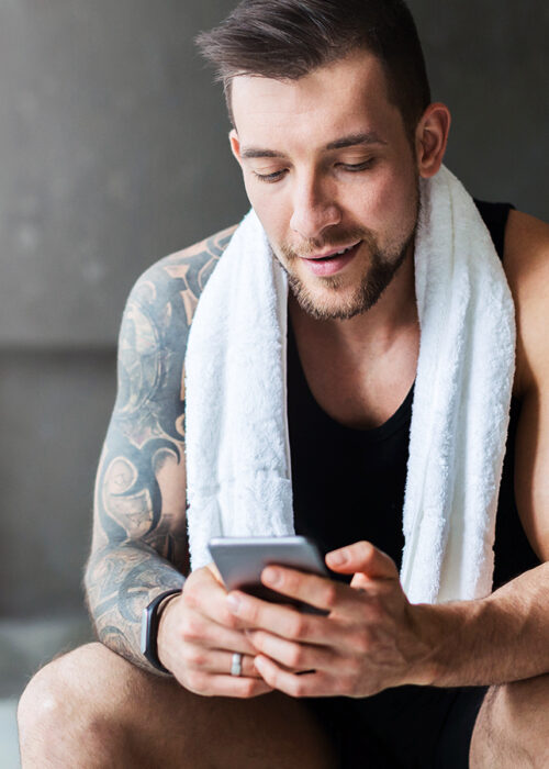 Man At Gym Shopping on Pur Pharma for Anabolic Steroids Online