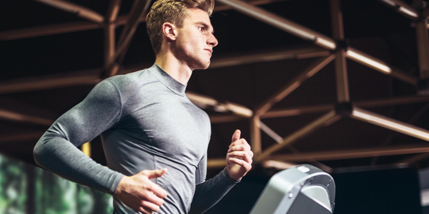 Fit Young Man on Treadmill