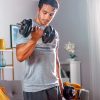 Man working out in his living room