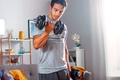 Man working out in his living room