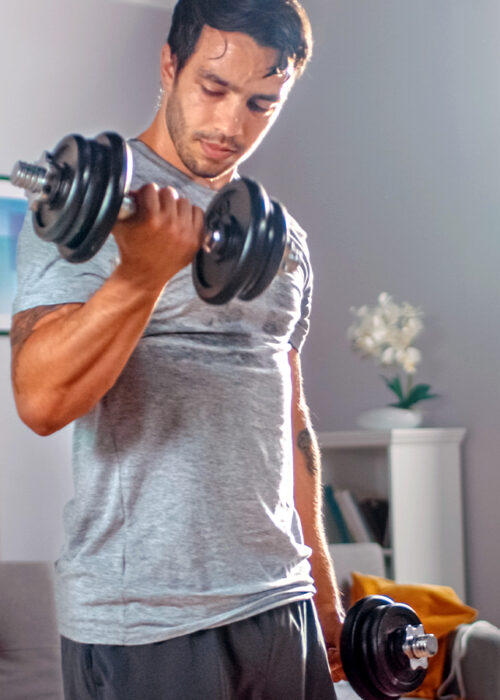 Man working out in his living room
