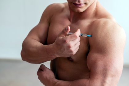 Man injection into his bicep