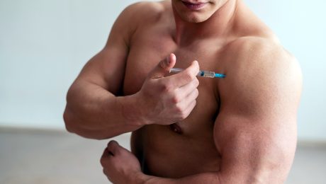 Man injection into his bicep