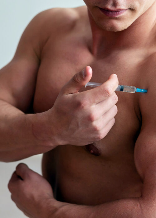 Man injection into his bicep